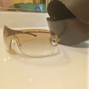 Gently used Gucci sunglasses, gold and brown tones